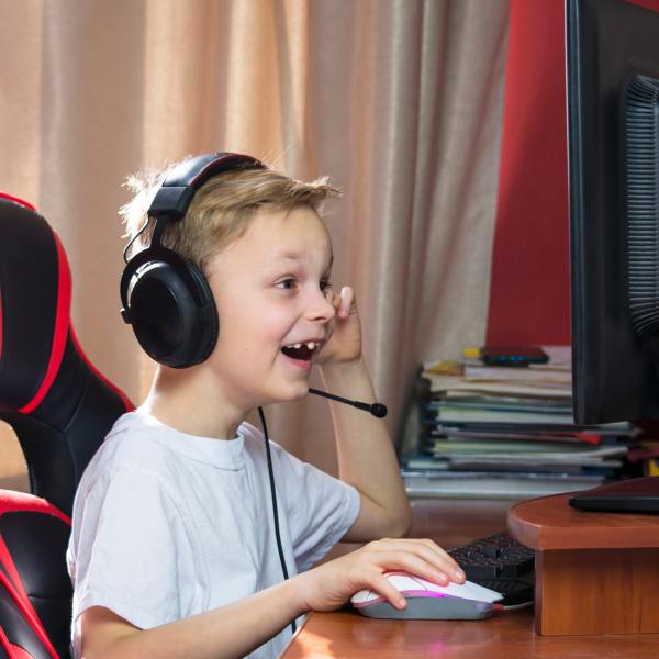 Student in gaming chair and headset