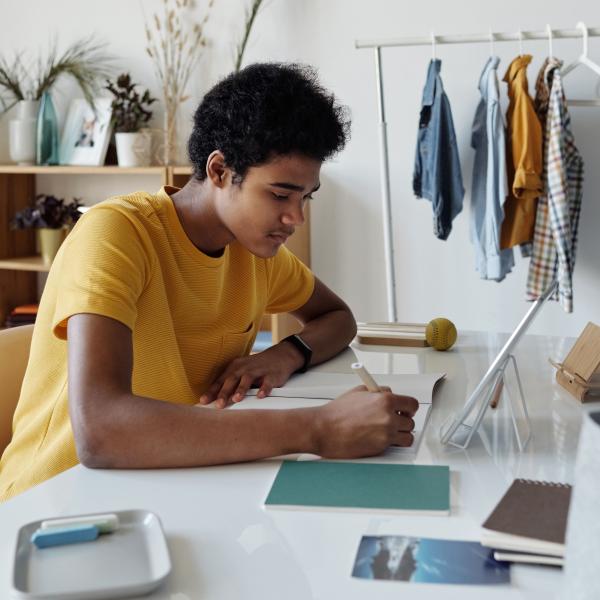 boy working at home on his schoolwork