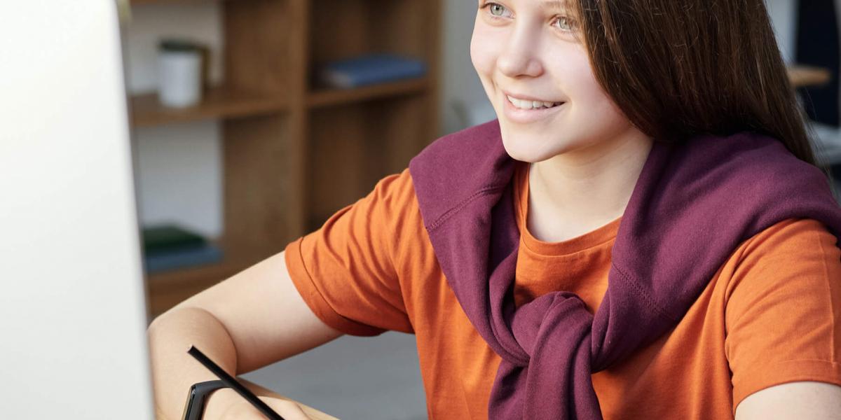 Girl looking at a computer screen