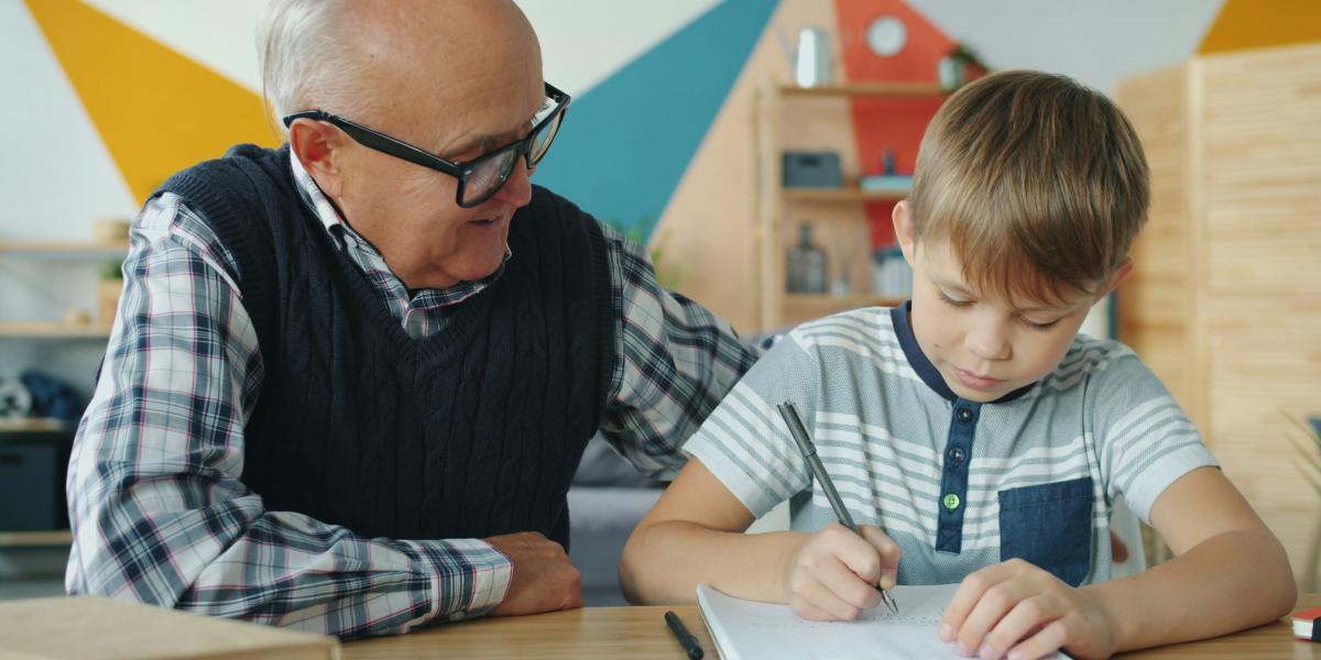 Caregiver helping child with homework