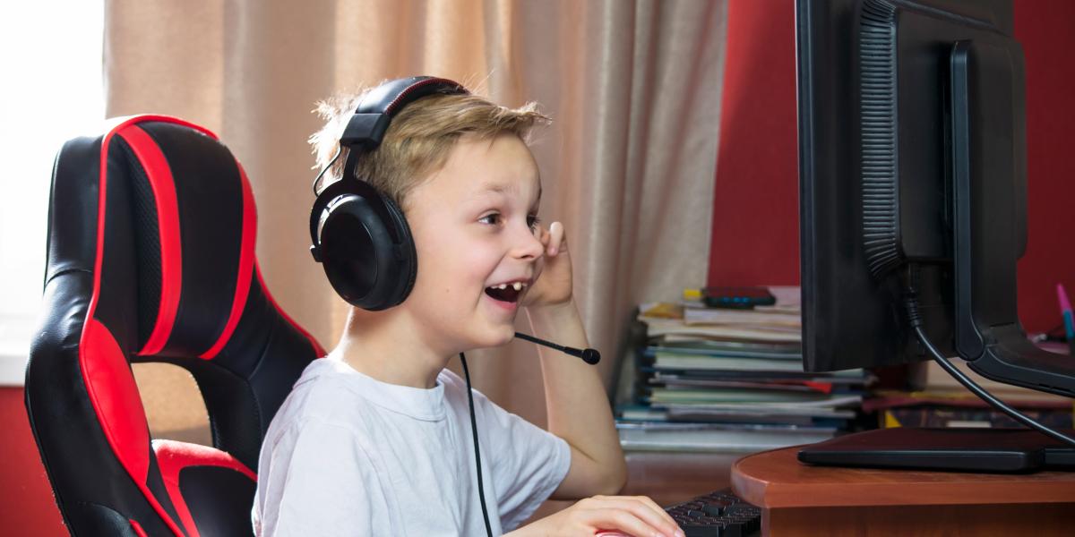 Student in gaming chair and headset